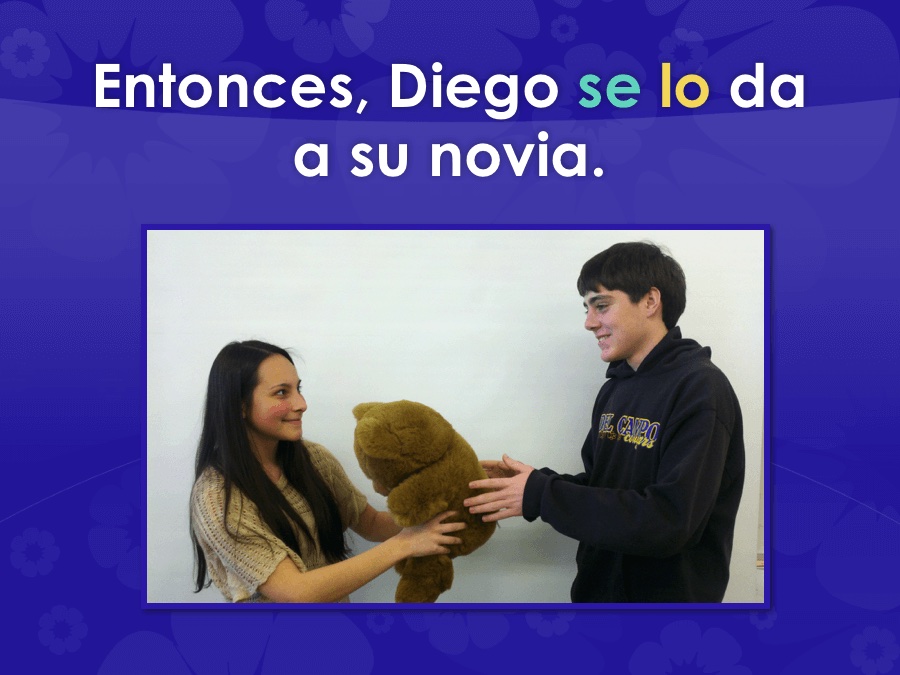 Spanish Double Object Pronoun TPR Story Boy giving girl a teddy bear. Entonces se lo da a su novia.